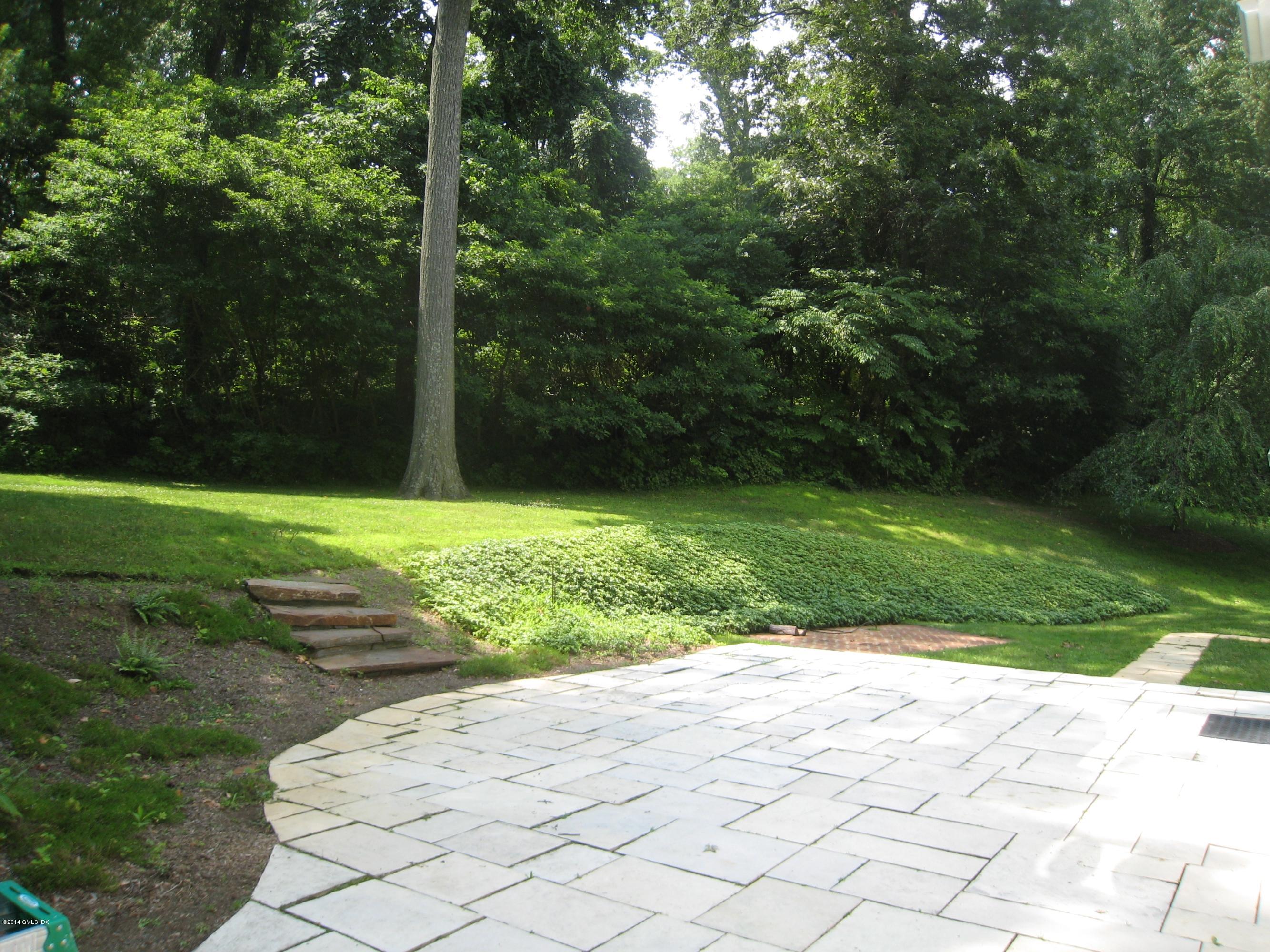 134 Butternut Hollow Road Greenwich, CT 06830 - Photo 11 of 15 a view of a park with large trees