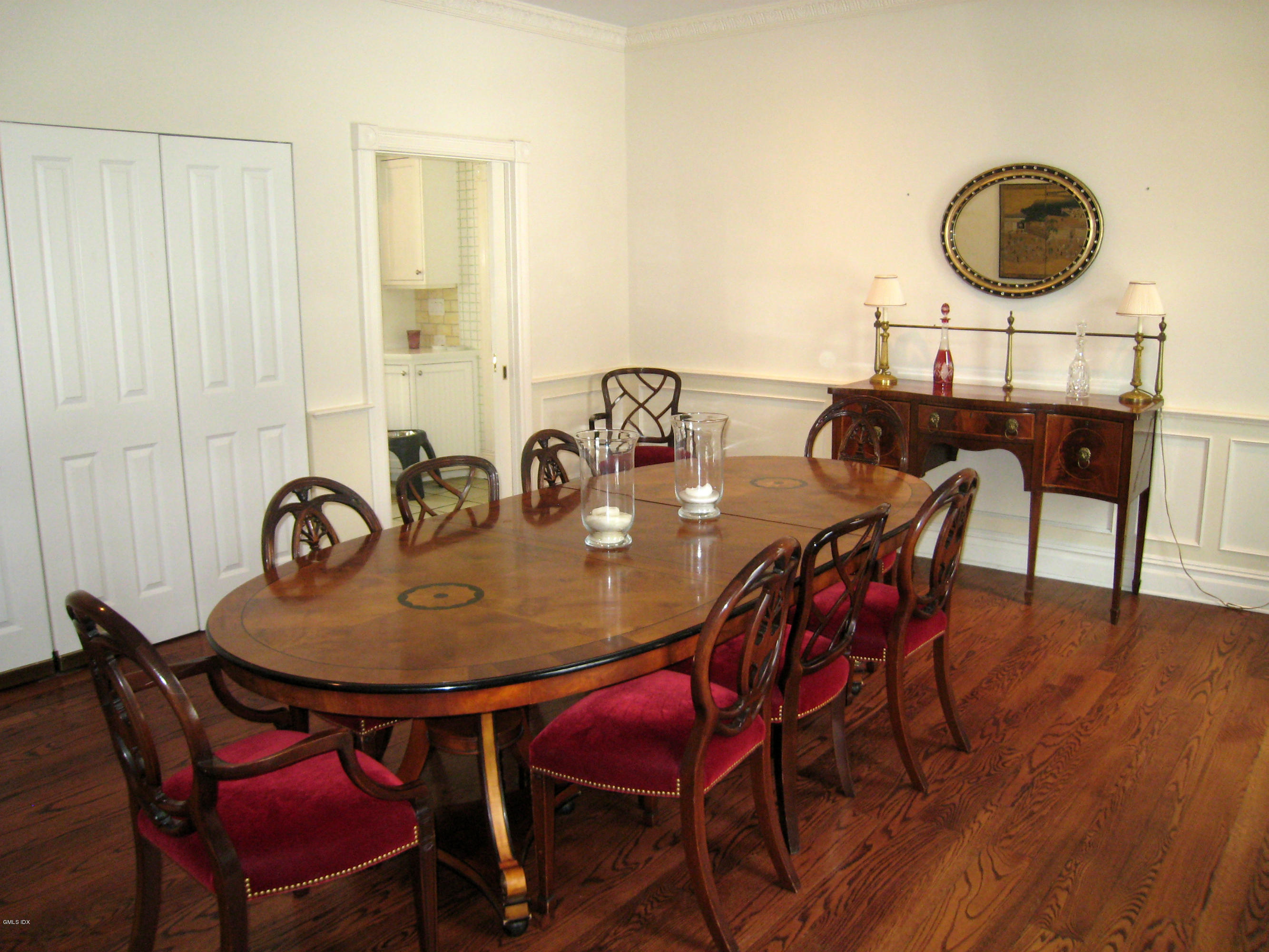 134 Butternut Hollow Road Greenwich, CT 06830 - Photo 4 of 15 a dining room with furniture and wooden floor