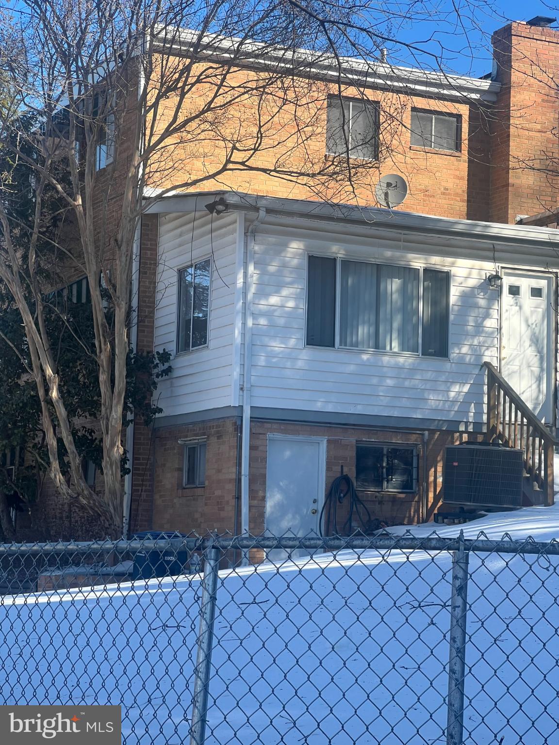 4901 Fitch Place Northeast Washington, DC 20019 - Photo 18 of 45 Charming home nestled in a snowy landscape.