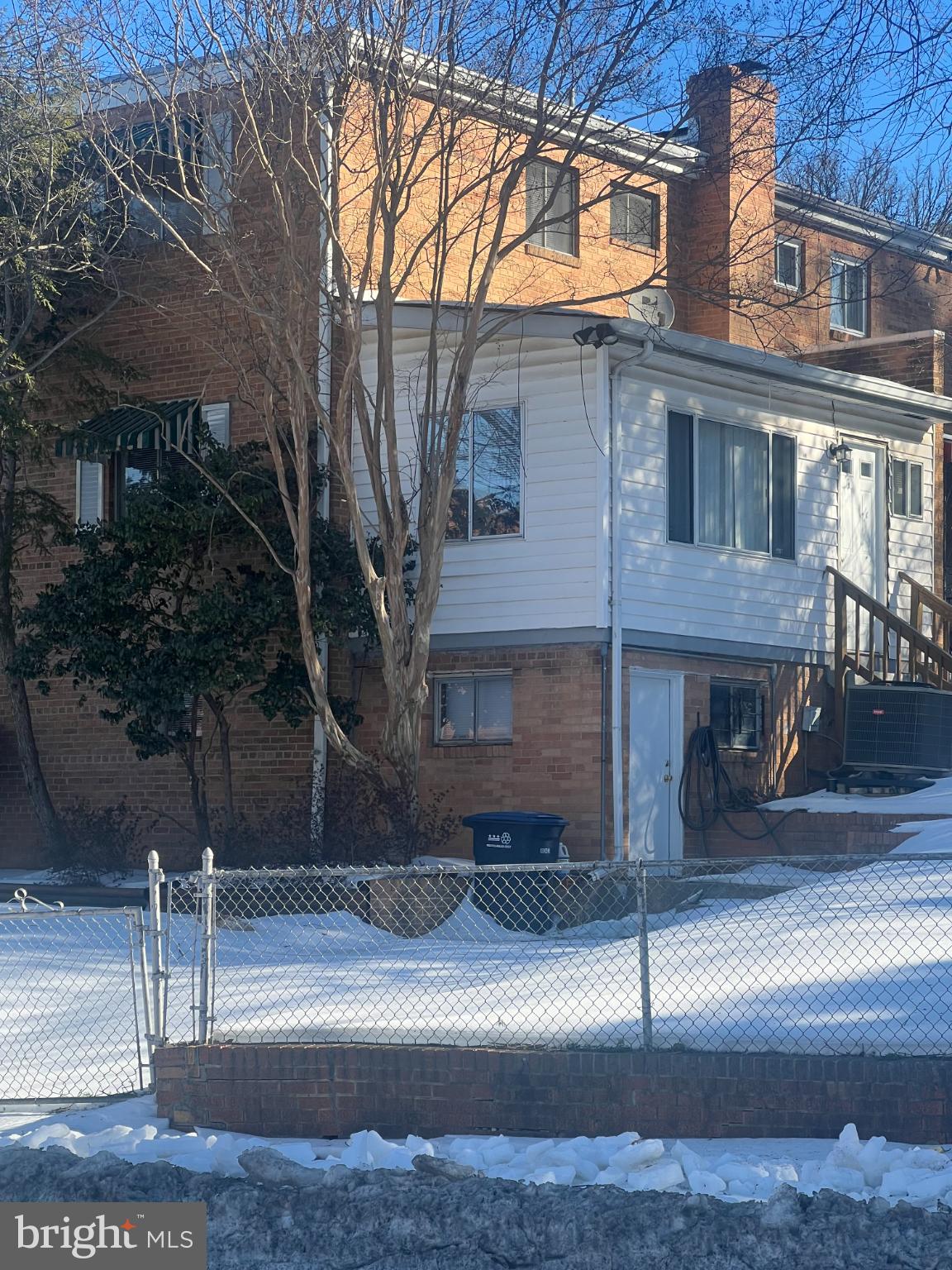 4901 Fitch Place Northeast Washington, DC 20019 - Photo 23 of 45 Charming home nestled in a snowy landscape.