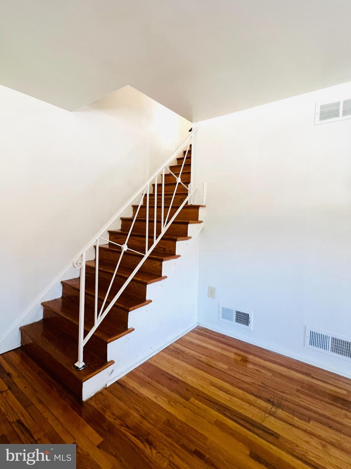 4901 Fitch Place Northeast Washington, DC 20019 - Photo 31 of 45 Elegant staircase with warm wooden tones.