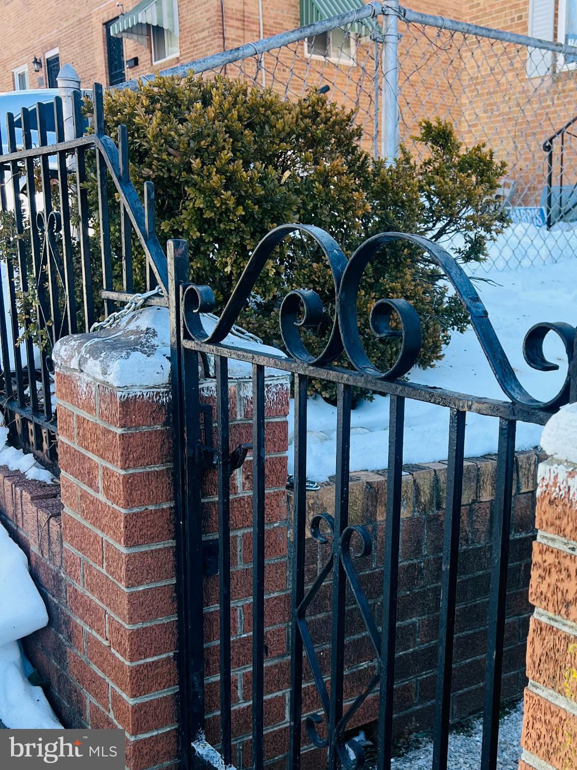 4901 Fitch Place Northeast Washington, DC 20019 - Photo 35 of 45 Charming gate framed by winter's touch.