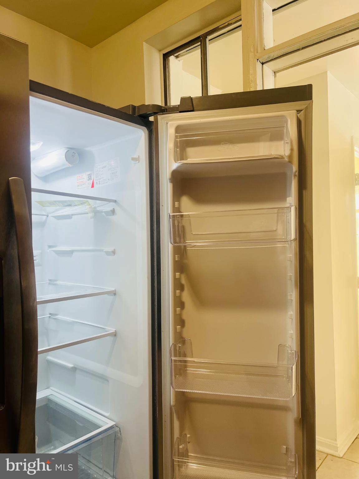 4901 Fitch Place Northeast Washington, DC 20019 - Photo 6 of 45 Modern fridge with ample storage space.