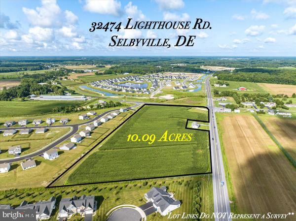 32474 Lighthouse Road Selbyville, DE 19975 - Photo 1 of 26 a sign on the street view