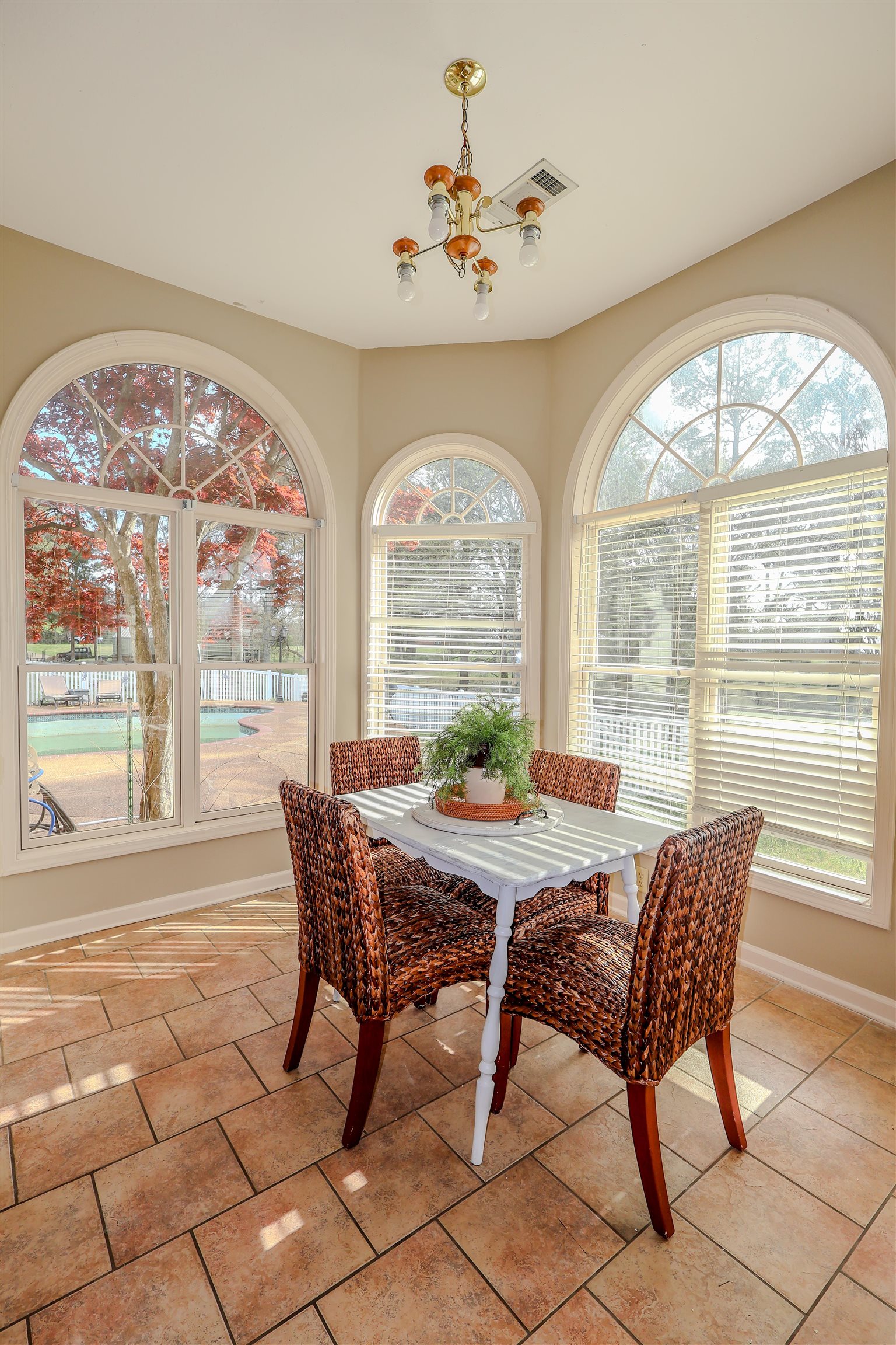 121 Reed Circle Drummonds, TN 38023 - Photo 6 of 38 Dining area featuring plenty of natural light, baseboards, a notable chandelier, and visible vents