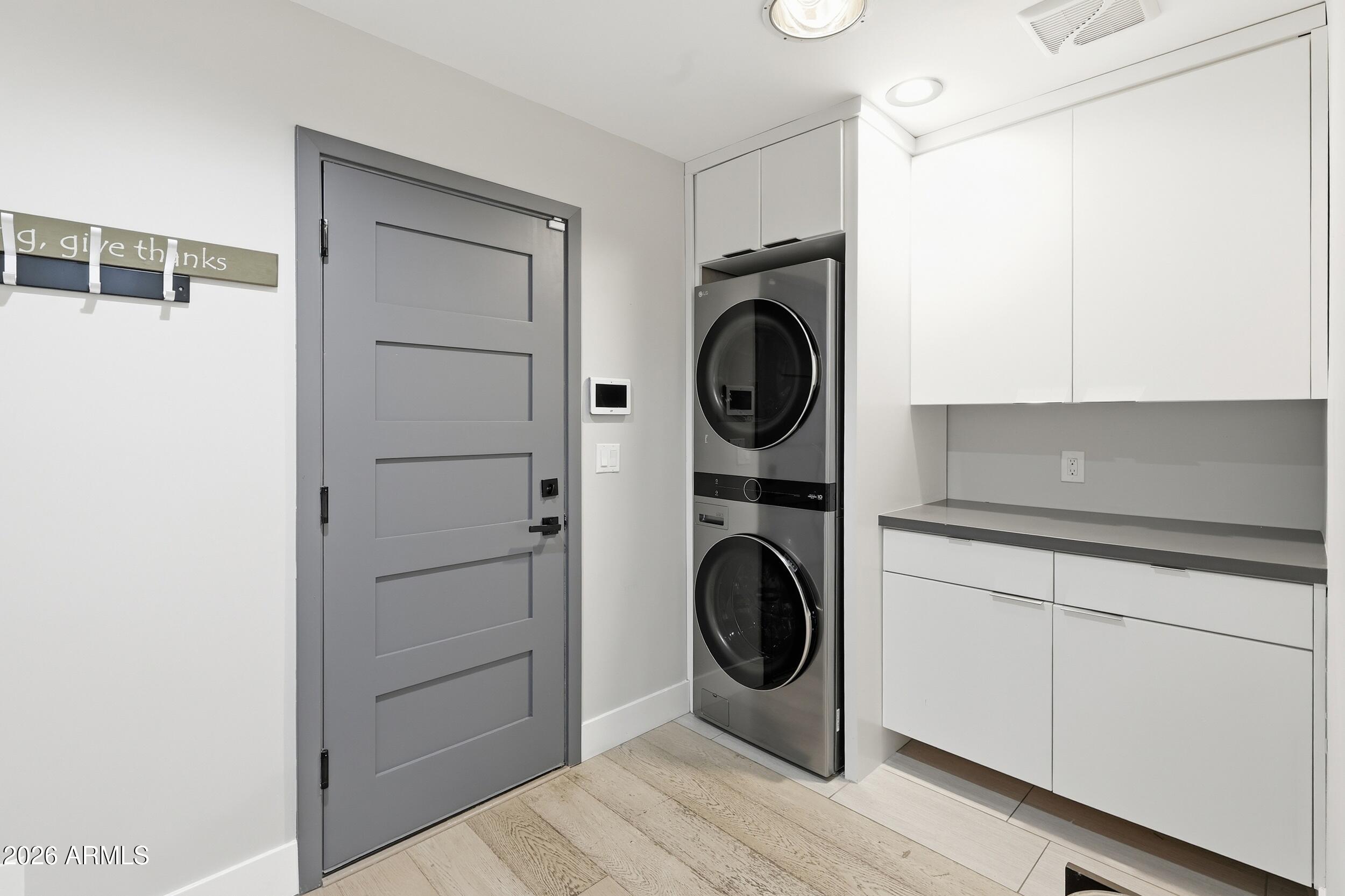 4417 East Mountain View Road Phoenix, AZ 85028 - Photo 16 of 41 a utility room with dryer and washer