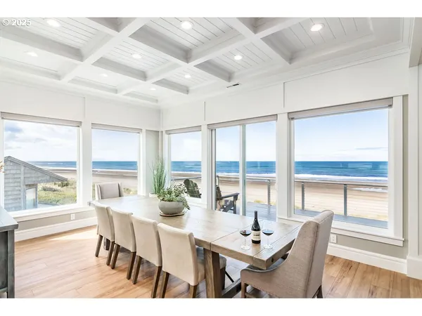 a dining room with large window