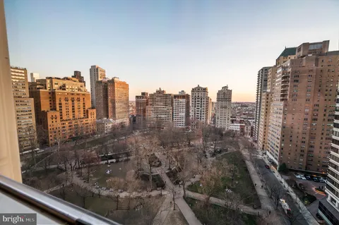 a view of a balcony with city view