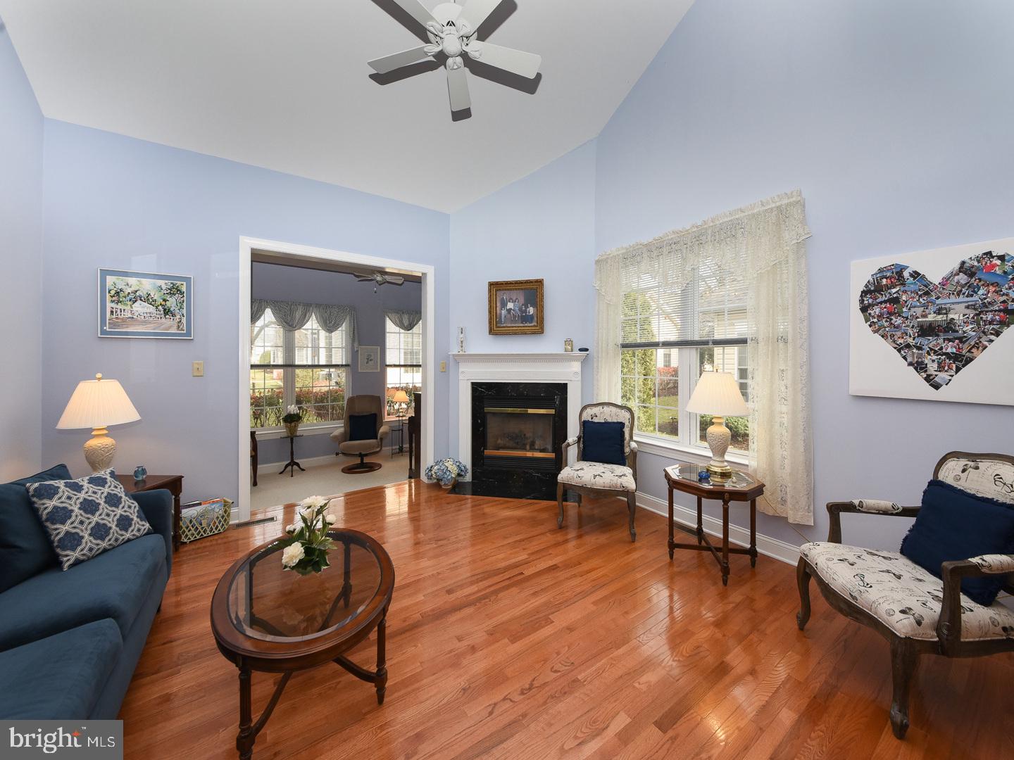 3113 Arborgreene Court Hatfield, PA 19440 - Photo 13 of 33 a living room with furniture and a fireplace