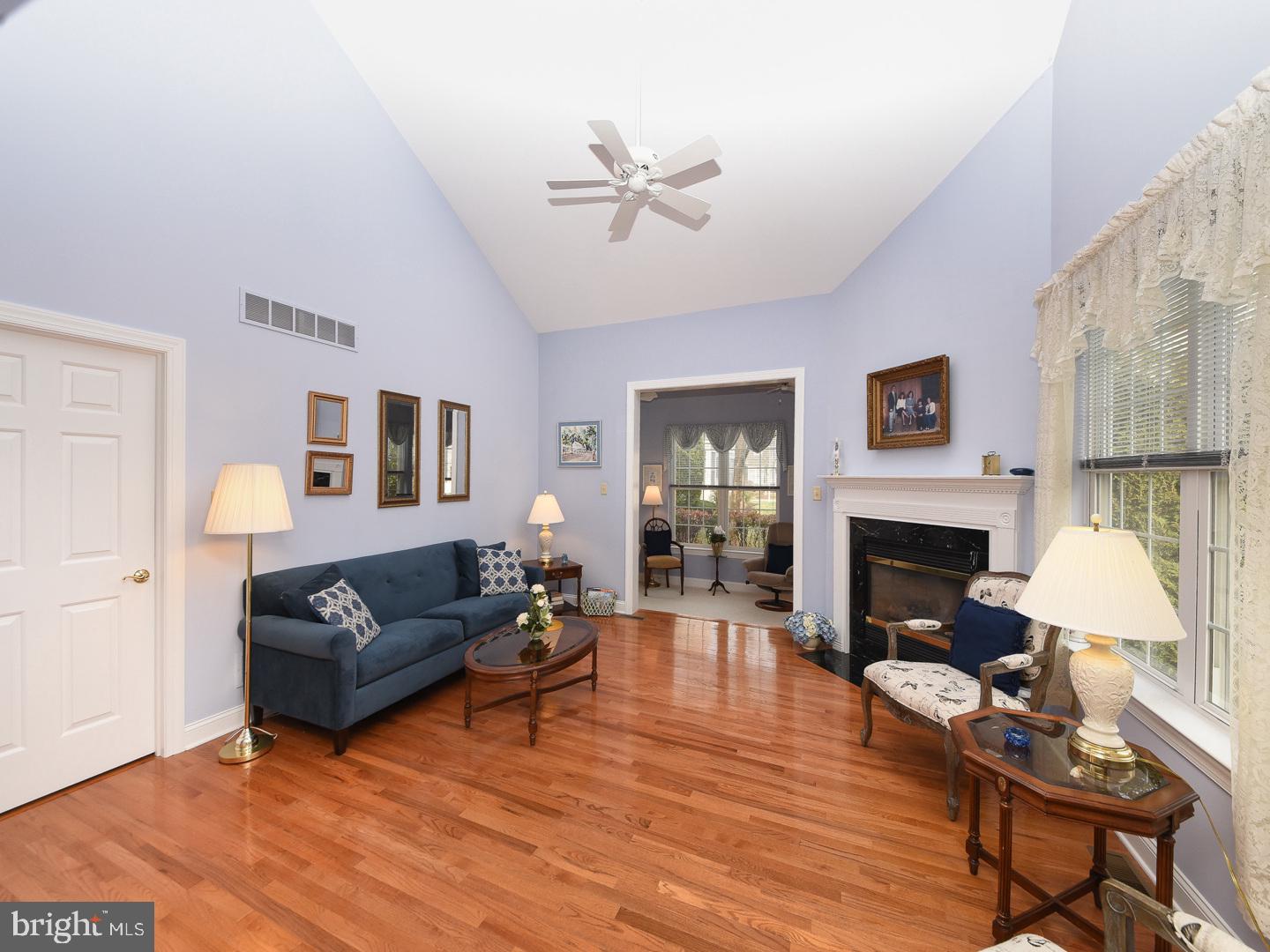 3113 Arborgreene Court Hatfield, PA 19440 - Photo 14 of 33 a living room with furniture and a fireplace