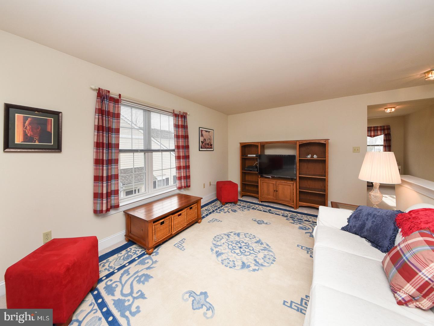 3113 Arborgreene Court Hatfield, PA 19440 - Photo 25 of 33 a living room with furniture and a flat screen tv