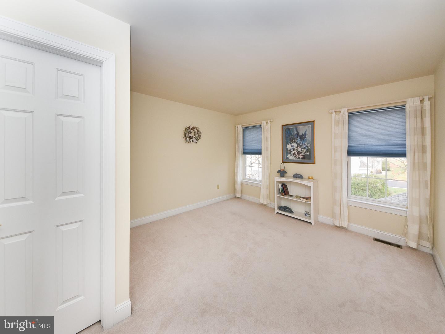 3113 Arborgreene Court Hatfield, PA 19440 - Photo 27 of 33 an empty room with furniture and a window