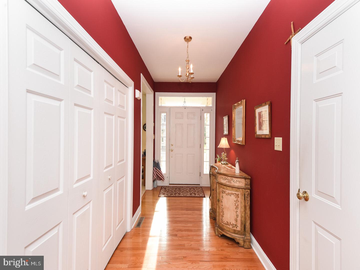 3113 Arborgreene Court Hatfield, PA 19440 - Photo 4 of 33 a view of a hallway with wooden floor and staircase