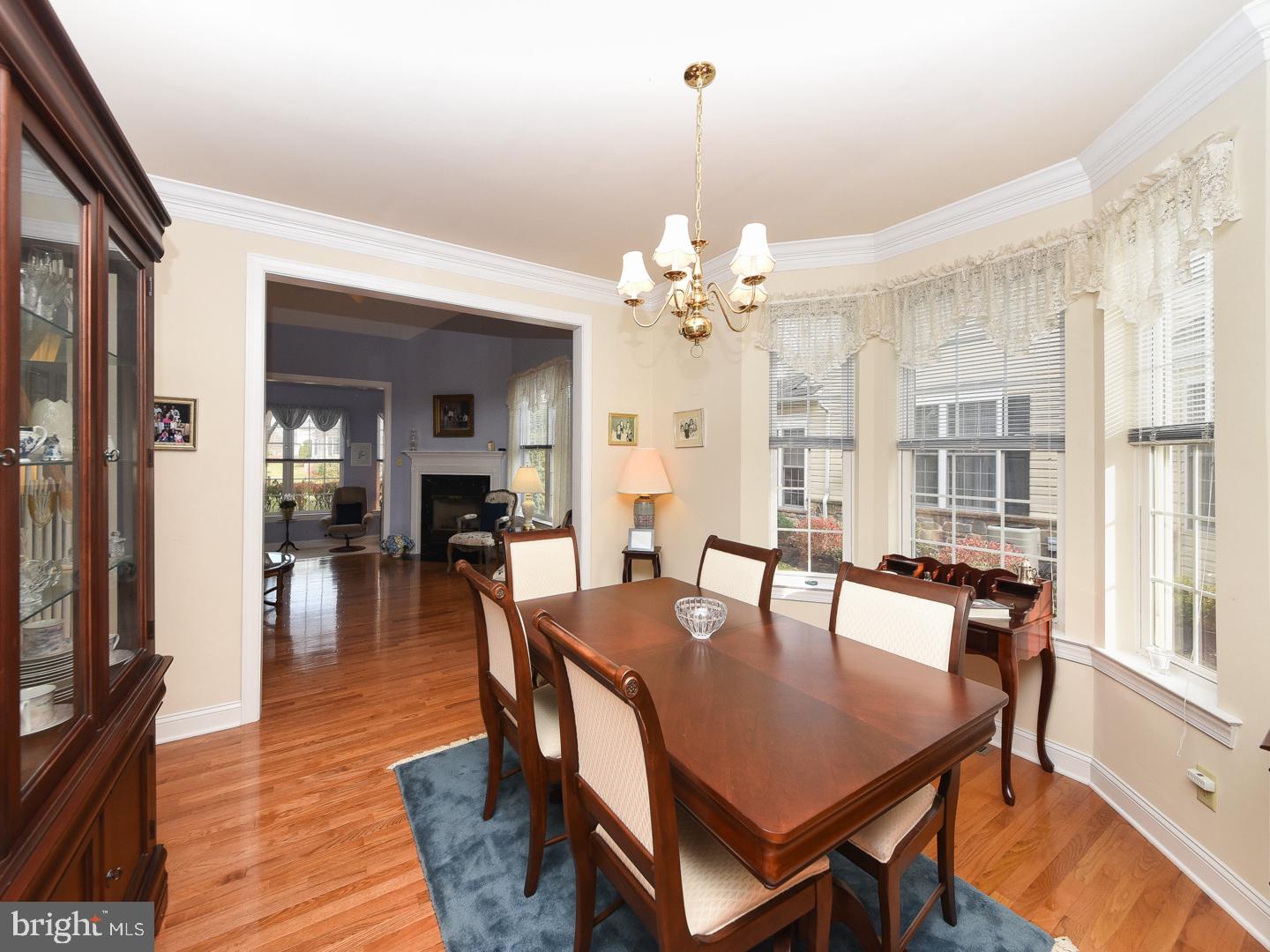 3113 Arborgreene Court Hatfield, PA 19440 - Photo 10 of 33 a view of a dining room with furniture and wooden floor