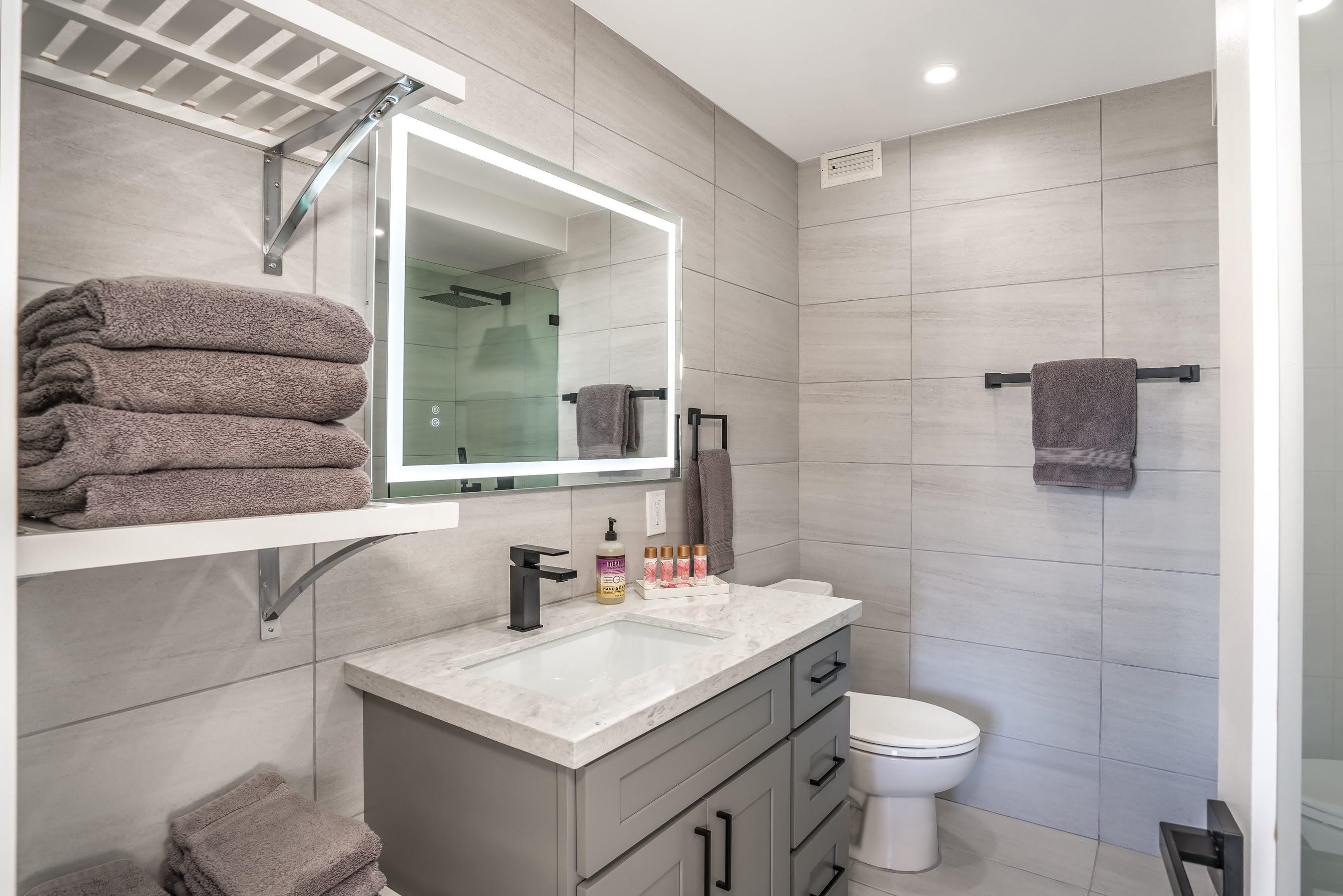 938 South Kihei Road, Unit 309 Kihei, HI 96753 - Photo 19 of 34 a bathroom with a sink toilet and shower