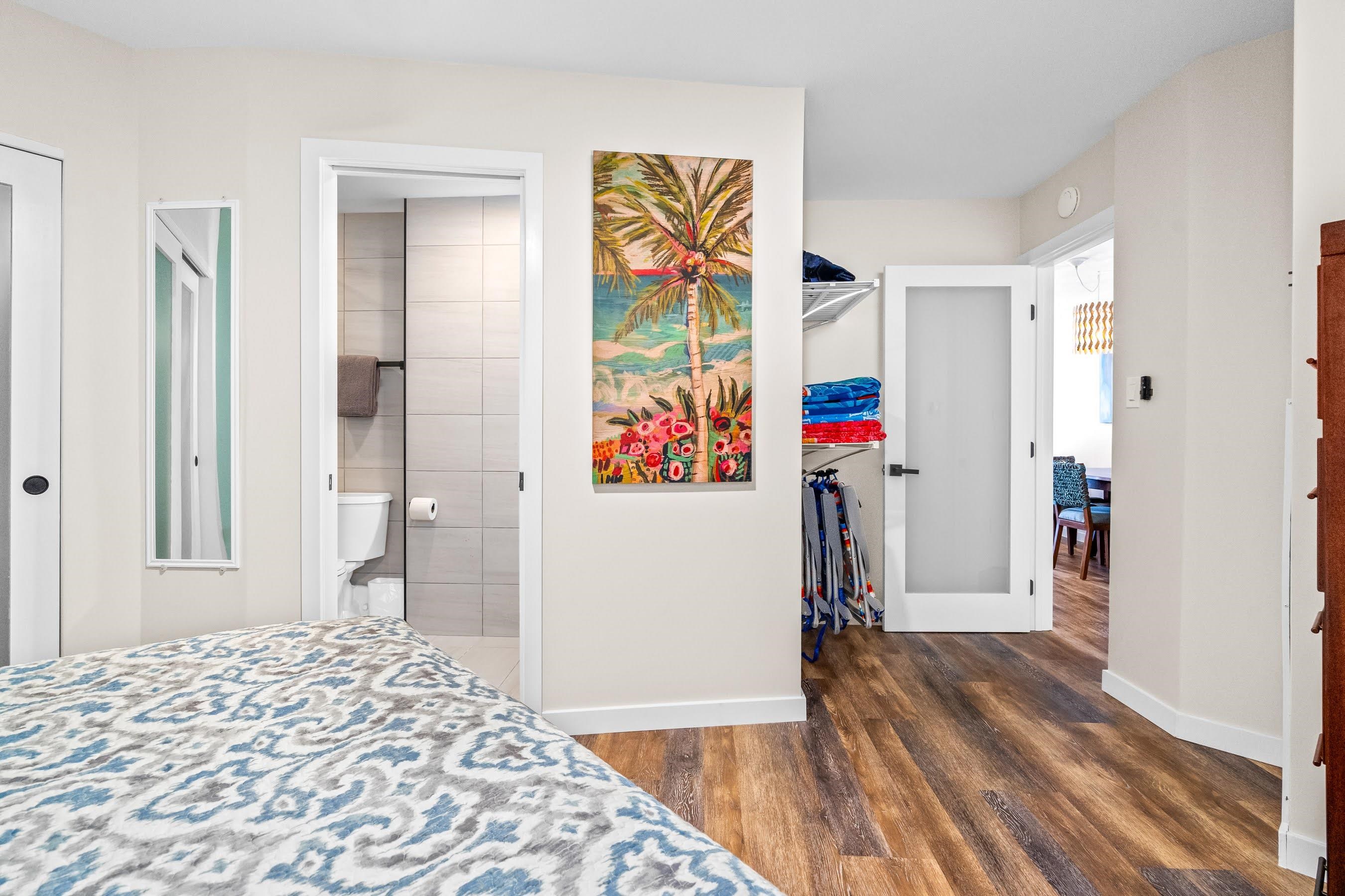 938 South Kihei Road, Unit 309 Kihei, HI 96753 - Photo 26 of 34 a view of a hallway with furniture and wooden floor