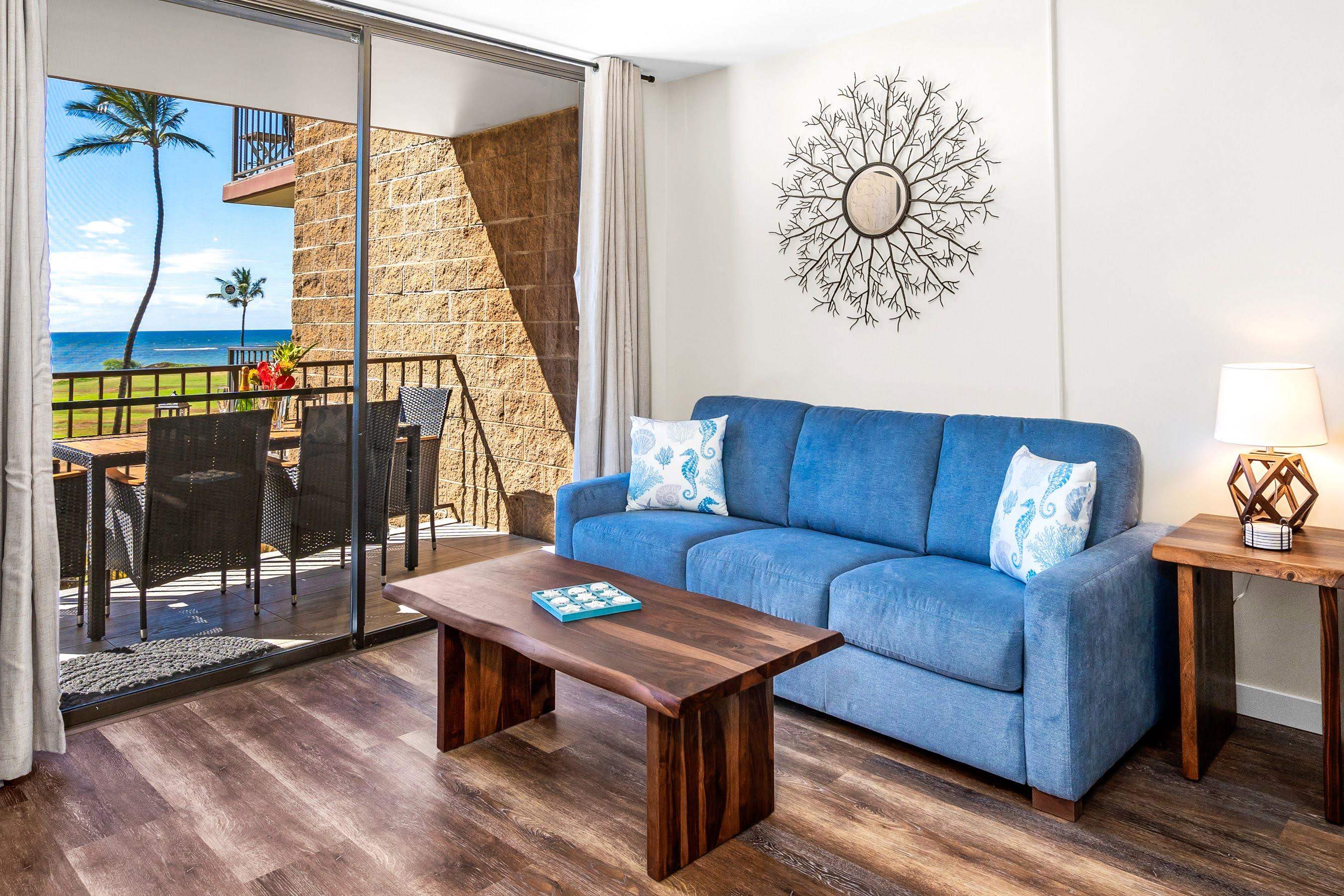 938 South Kihei Road, Unit 309 Kihei, HI 96753 - Photo 5 of 34 a living room with furniture and a floor to ceiling window