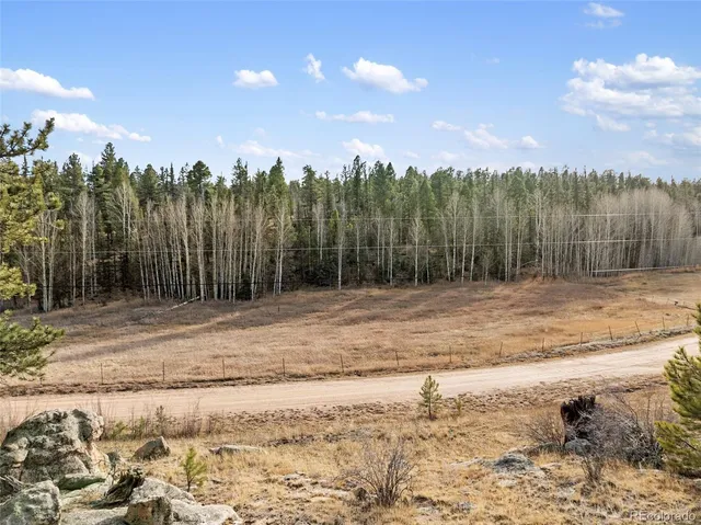 a view of a backyard of a house