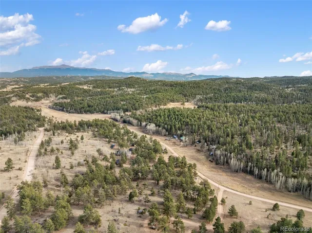 a view of a lake with a mountain