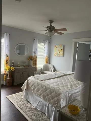 a bedroom with a bed and a dresser