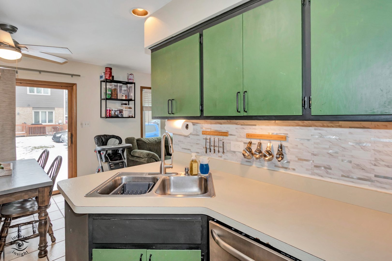 14411 Lamon Avenue Midlothian, IL 60445 - Photo 13 of 26 a kitchen with a sink cabinets and a table