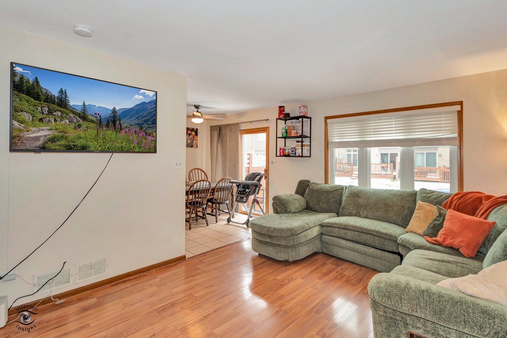 14411 Lamon Avenue Midlothian, IL 60445 - Photo 8 of 26 a living room with furniture and a large window