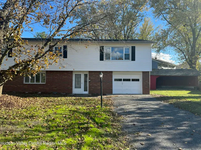 a front view of house with yard