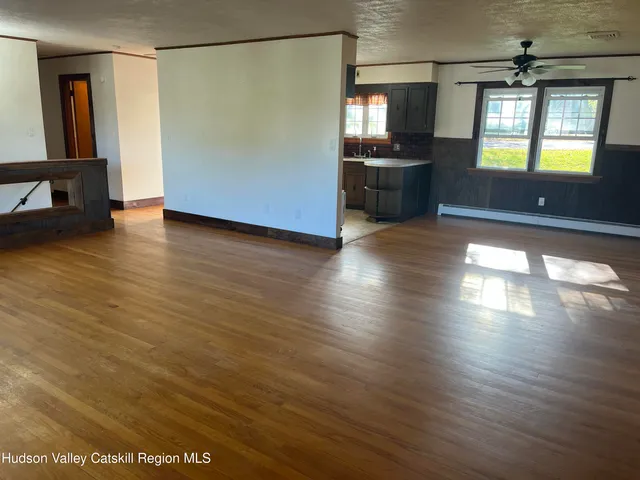 a kitchen with stainless steel appliances granite countertop a stove and a refrigerator