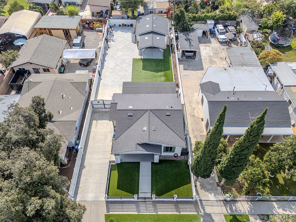1130 West Chestnut Avenue Santa Ana, CA 92703 - Photo 13 of 20 an aerial view of multiple houses with yard