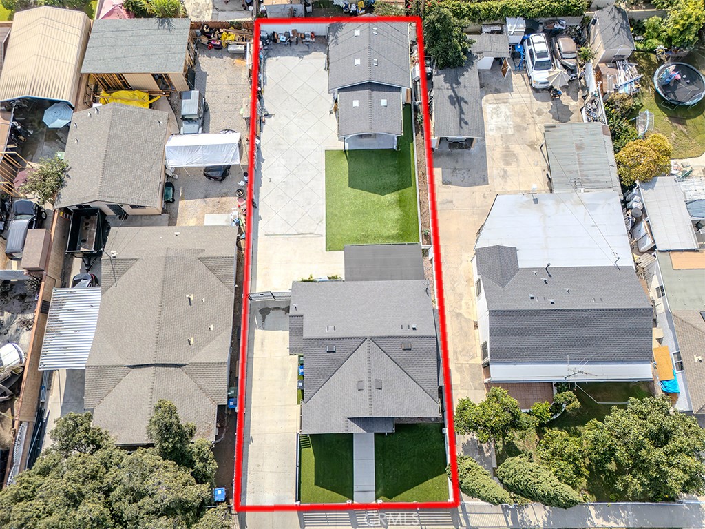 1130 West Chestnut Avenue Santa Ana, CA 92703 - Photo 17 of 20 an aerial view of residential houses with outdoor space