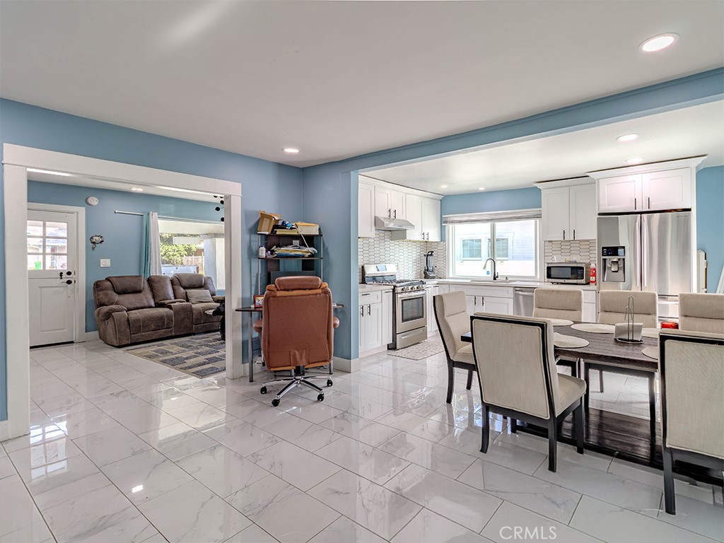 1130 West Chestnut Avenue Santa Ana, CA 92703 - Photo 3 of 20 a view of a dining room with furniture