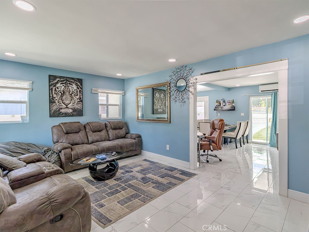 1130 West Chestnut Avenue Santa Ana, CA 92703 - Photo 6 of 20 a living room with furniture a window and a table