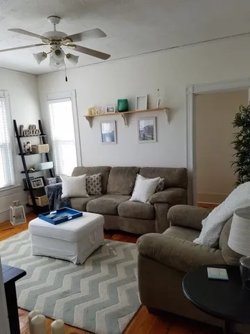 a living room with furniture and a couch