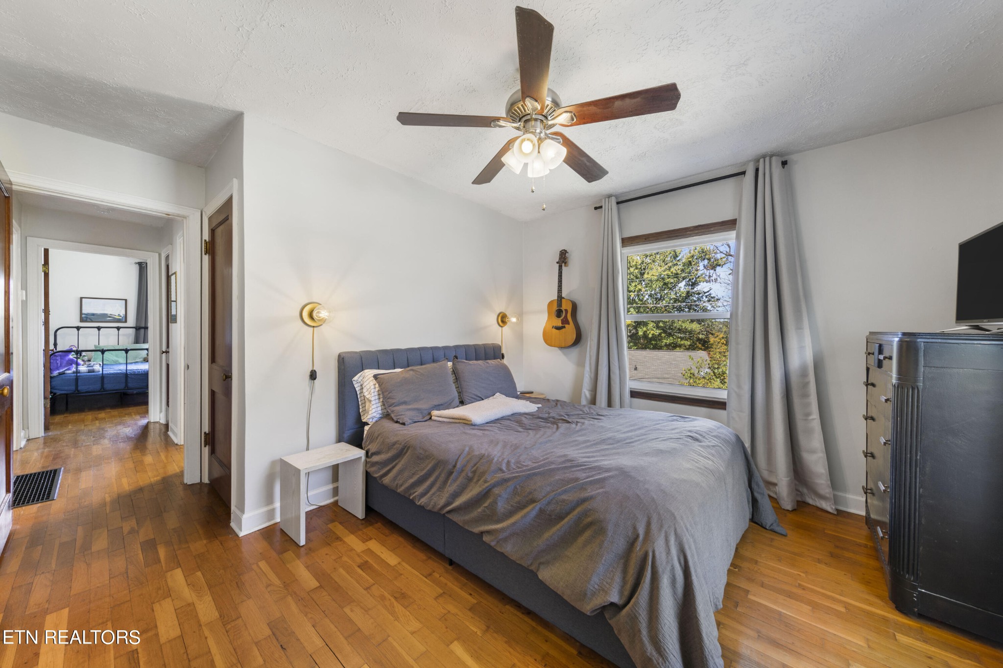 405 Mark Road Knoxville, TN 37920 - Photo 17 of 24 a bedroom with a bed and a walk in closet