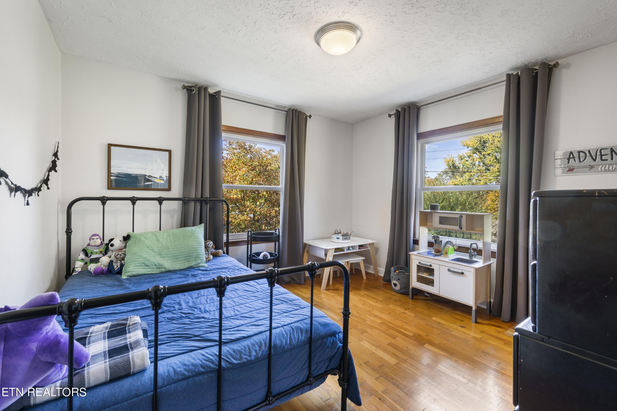 405 Mark Road Knoxville, TN 37920 - Photo 19 of 24 a bedroom with furniture and a window