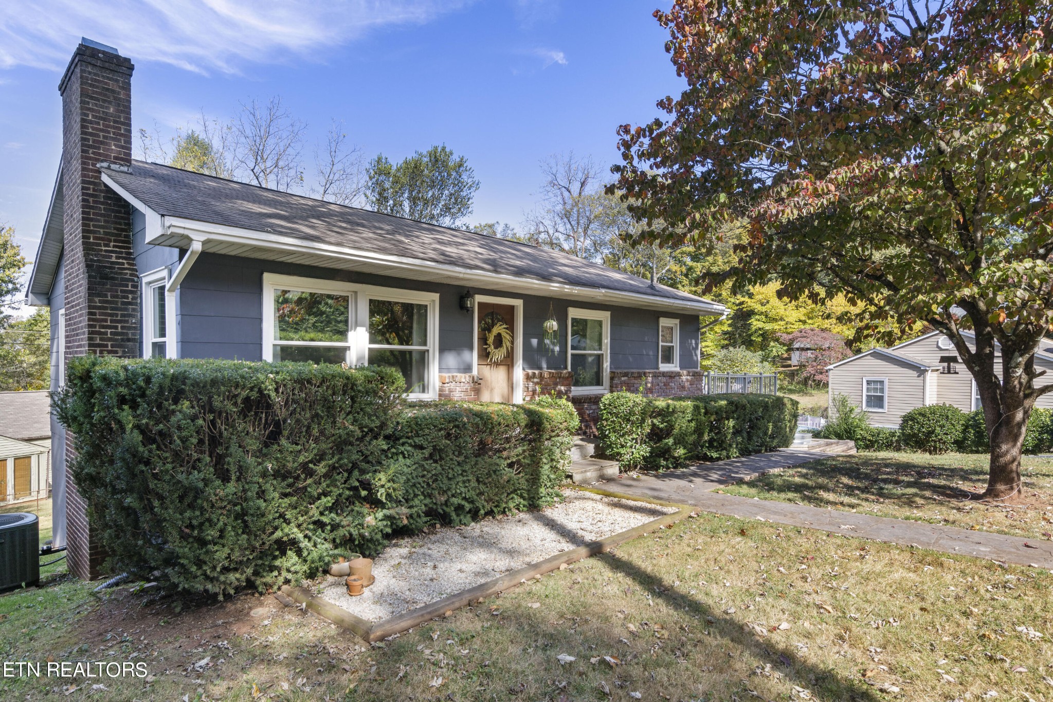 405 Mark Road Knoxville, TN 37920 - Photo 3 of 24 a front view of a house with a yard