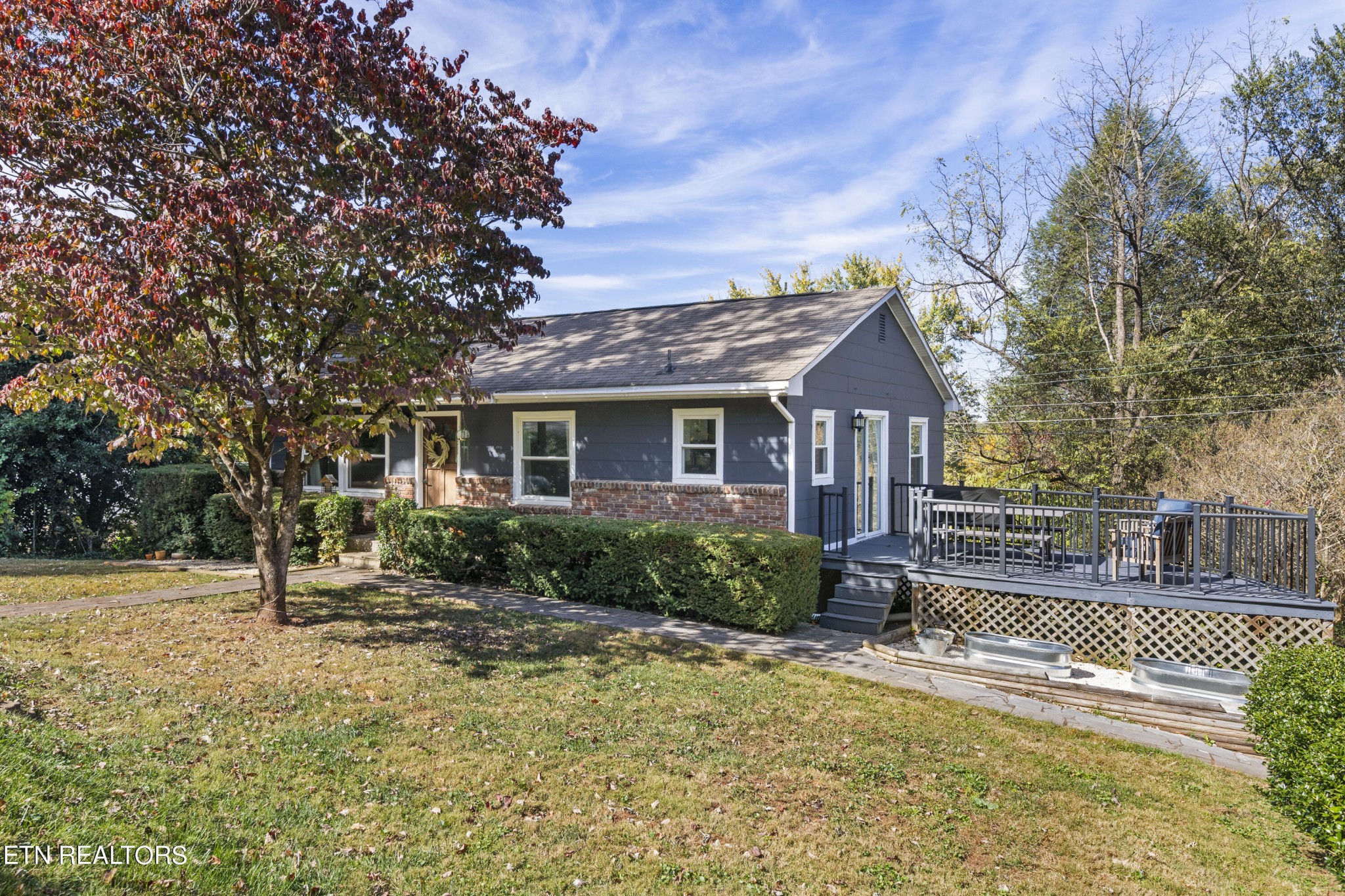 405 Mark Road Knoxville, TN 37920 - Photo 5 of 24 a front view of a house with a yard