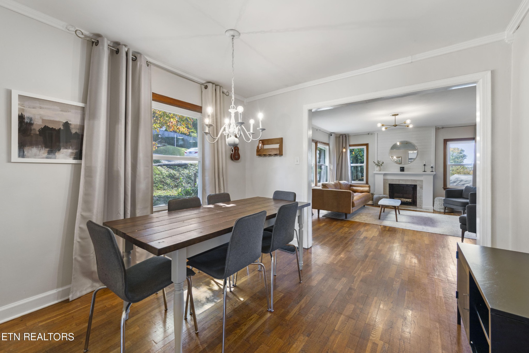 405 Mark Road Knoxville, TN 37920 - Photo 9 of 24 a view of a dining room with furniture wooden floor and chandelier