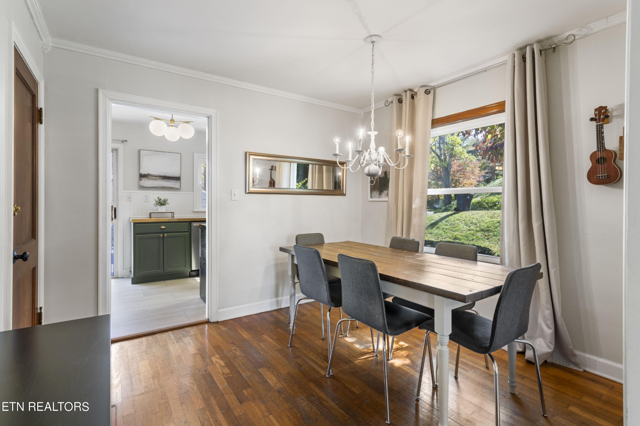 405 Mark Road Knoxville, TN 37920 - Photo 10 of 24 a view of a dining room with furniture window and wooden floor