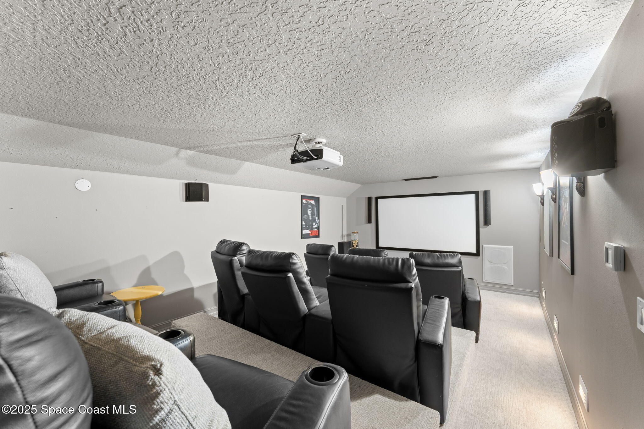 133 Windemere Place Melbourne Beach, FL 32951 - Photo 32 of 75 a living room with furniture and a flat screen tv