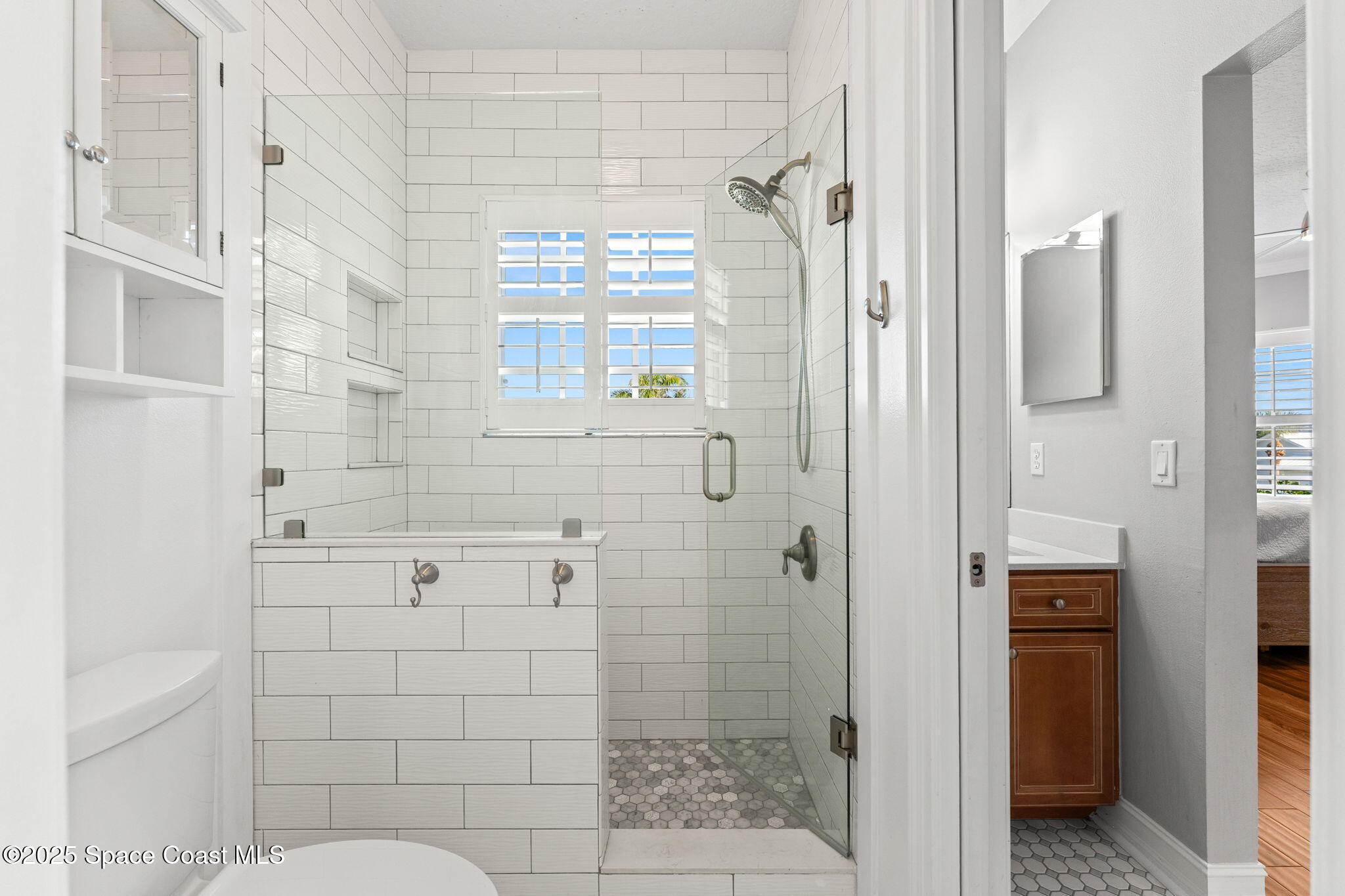 133 Windemere Place Melbourne Beach, FL 32951 - Photo 37 of 75 a bathroom with a shower and a sink