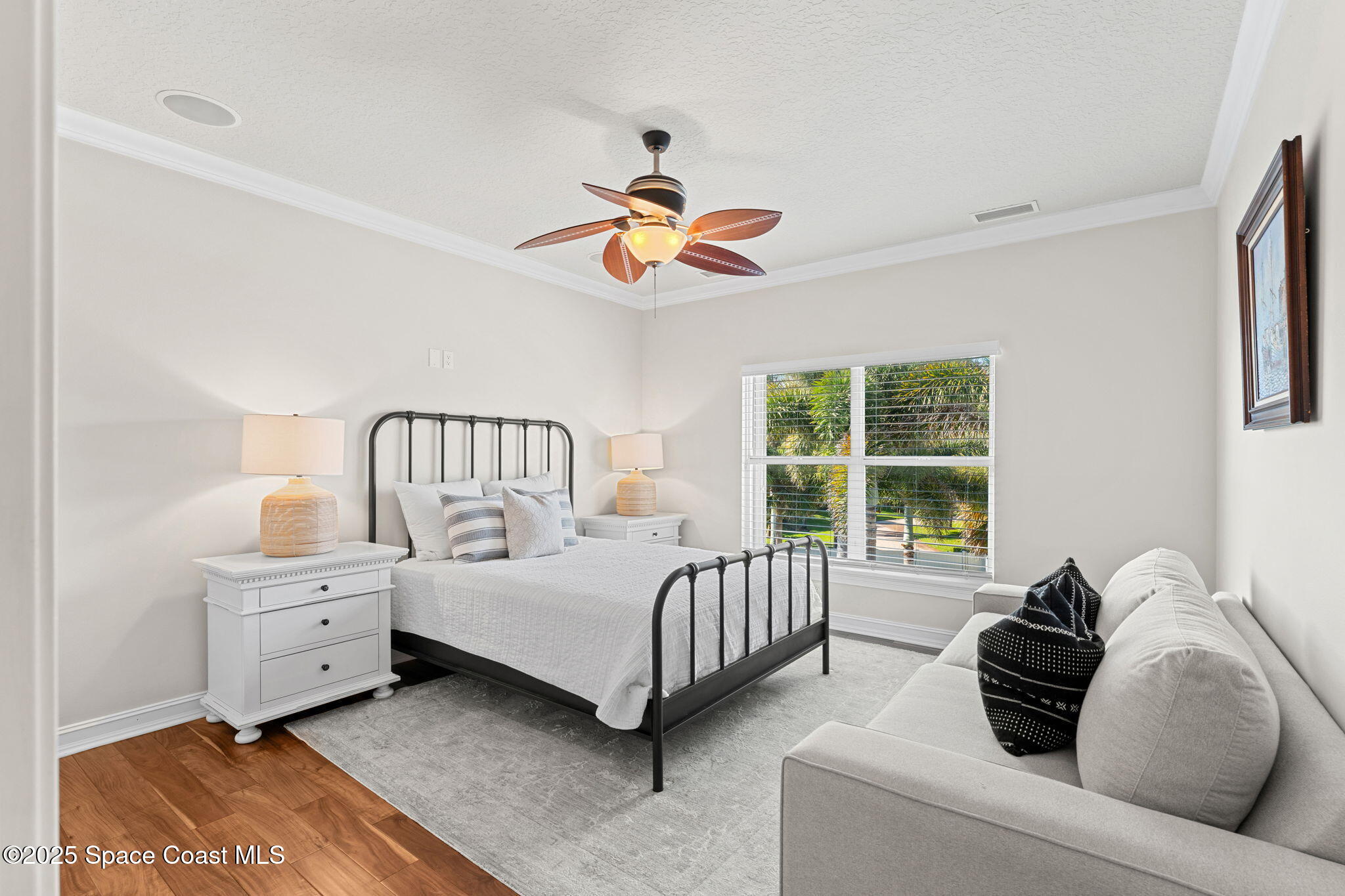 133 Windemere Place Melbourne Beach, FL 32951 - Photo 41 of 75 a bed room with bed and a large window