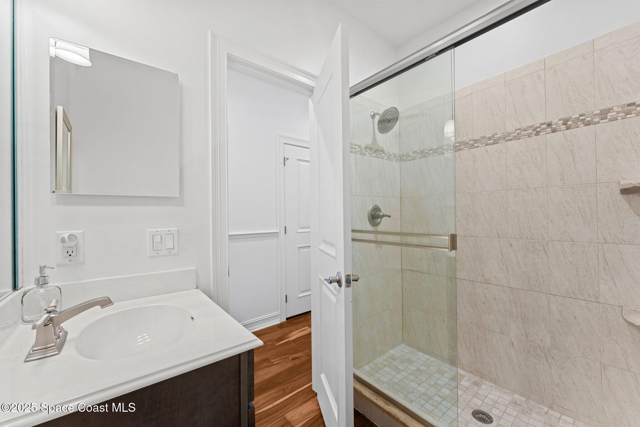 133 Windemere Place Melbourne Beach, FL 32951 - Photo 42 of 75 a bathroom with a sink a toilet and shower