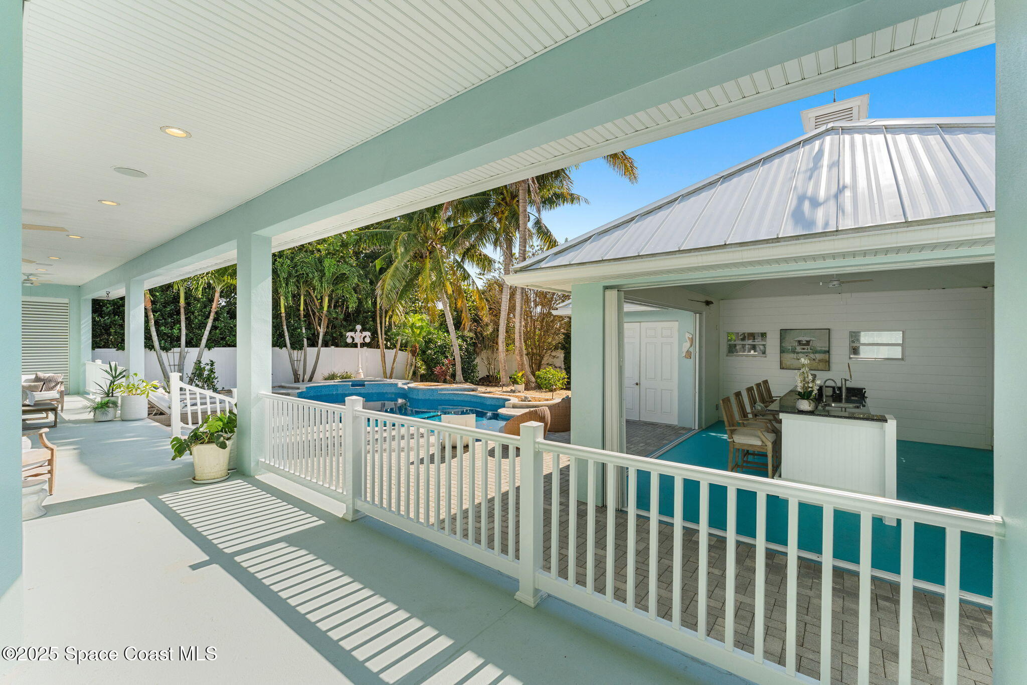 133 Windemere Place Melbourne Beach, FL 32951 - Photo 47 of 75 a view of a porch with furniture