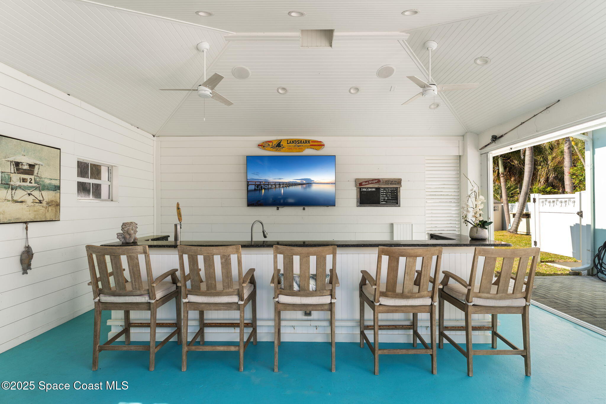 133 Windemere Place Melbourne Beach, FL 32951 - Photo 54 of 75 a dining room with furniture and window