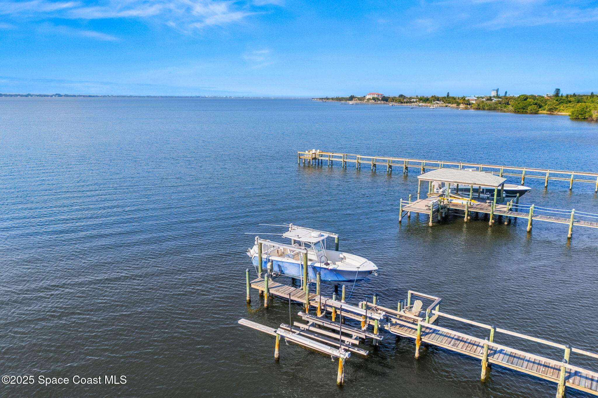 133 Windemere Place Melbourne Beach, FL 32951 - Photo 60 of 75 a view of a terrace with chairs