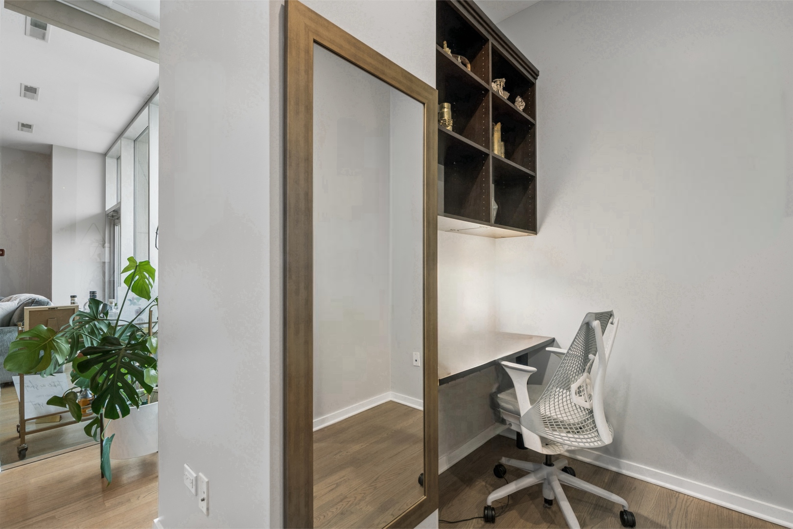 500 West Superior Street, Unit 813 Chicago, IL 60654 - Photo 10 of 18 a view of workspace with wooden floor and chair