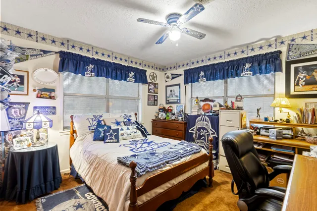 a bed room with a bed and a couch