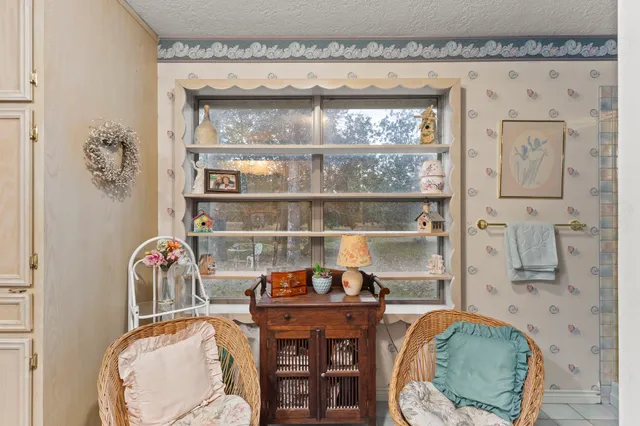 a room with granite countertop a wooden floor