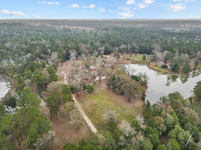 a view of a yard with a lake